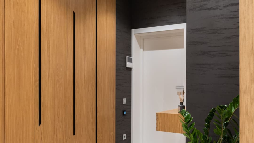 Hallway with a wardrobe in an oak decor and full-height fronts